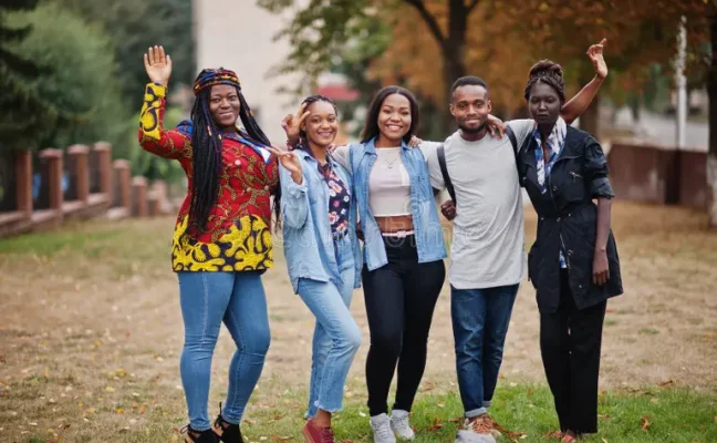 row group five african college students spending time together campus university yard black afro friends studying 219664079